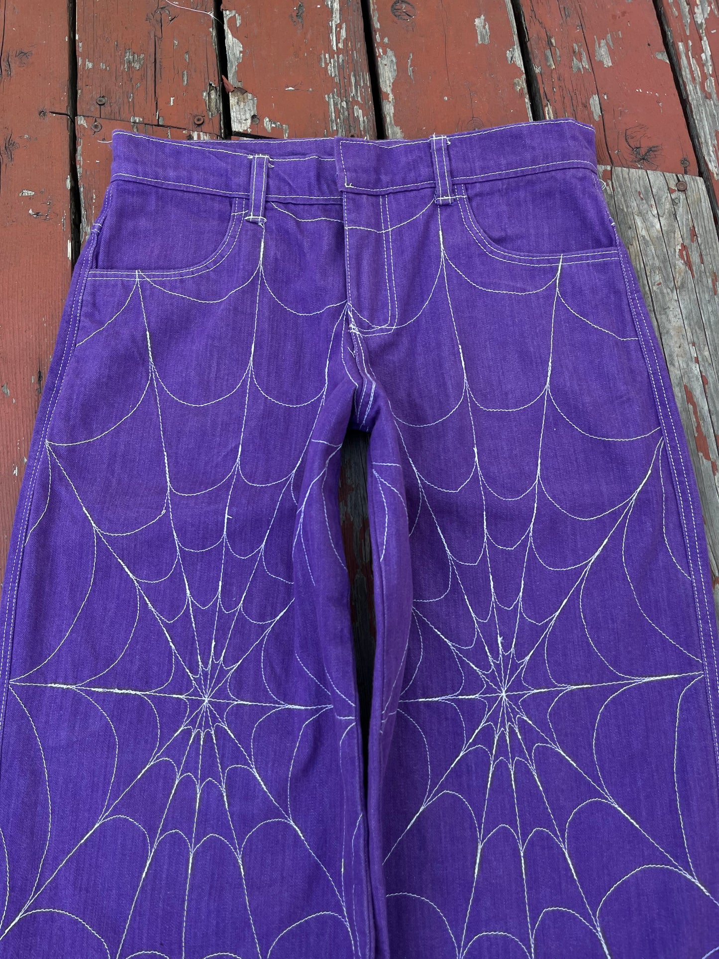 Purple web jeans
