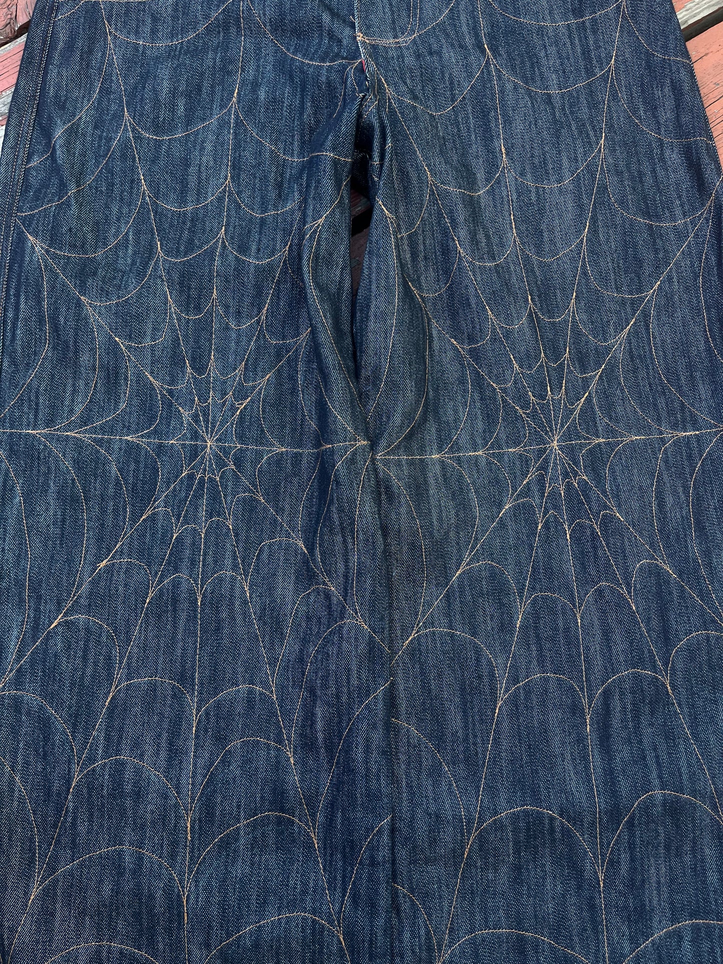 Classic denim spiderweb jeans